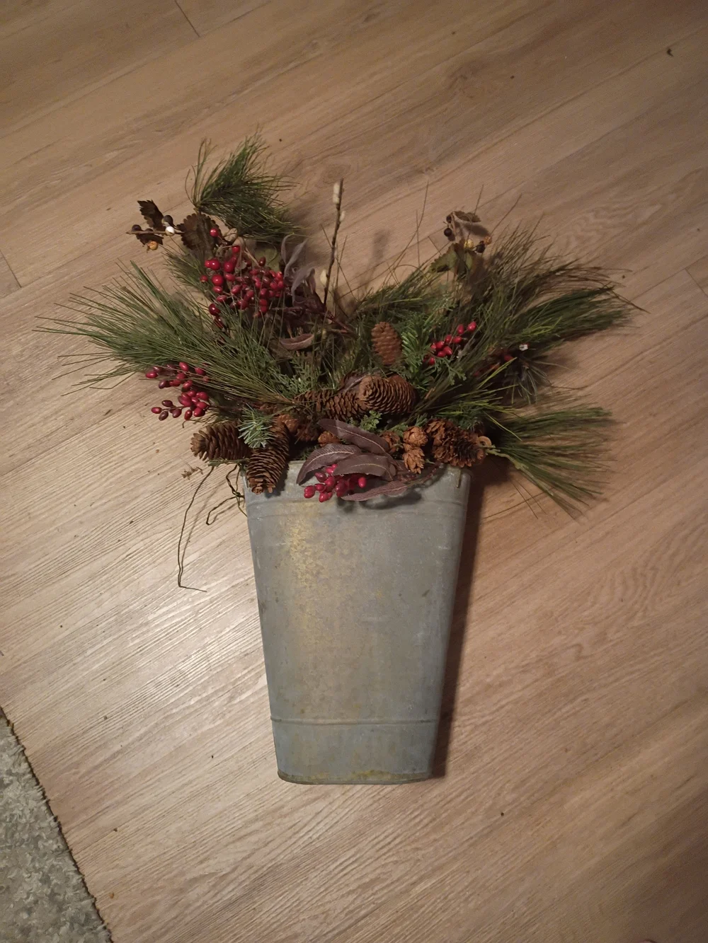 Holiday Pine & Berry Arrangement in Rustic Metal Vase